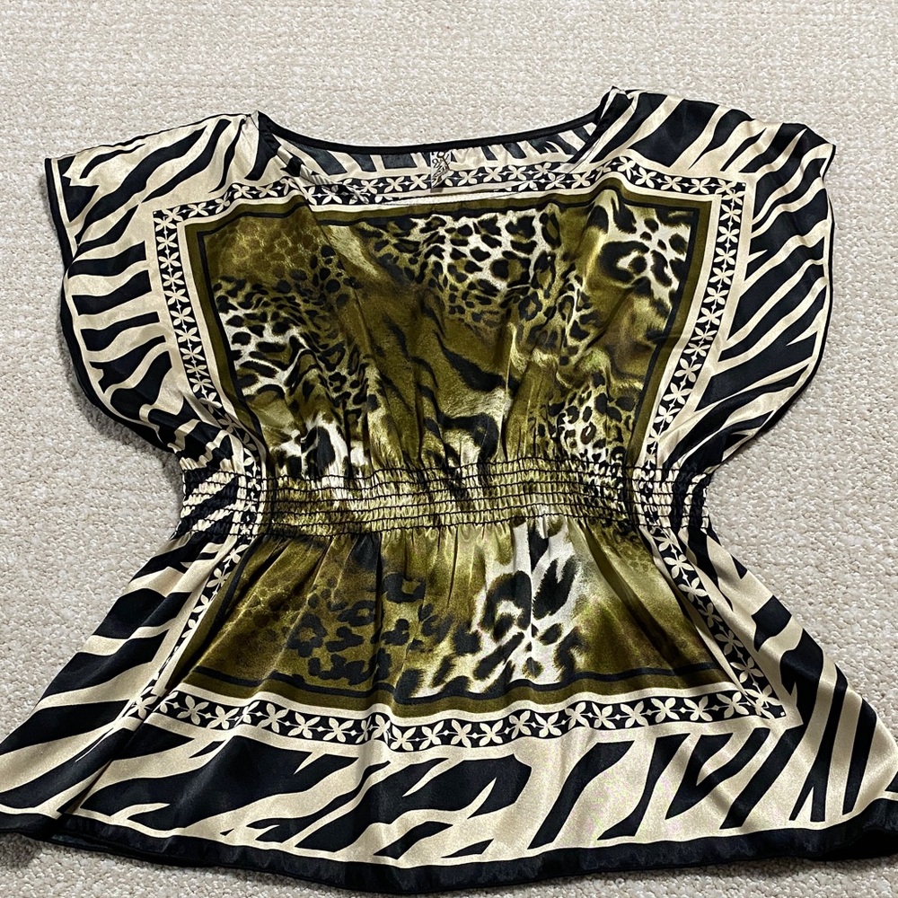 Chic Animal Print Blouse with Zebra Accents - Picture 10 of 16